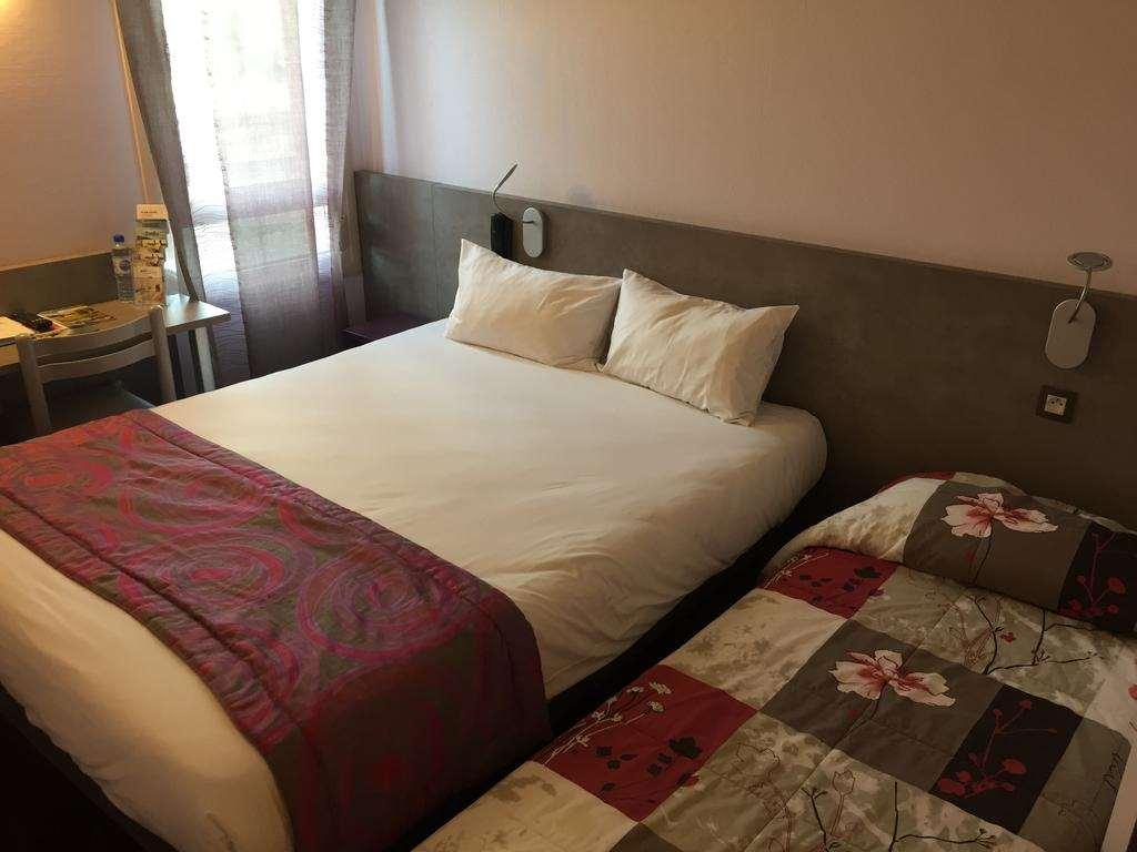 Brit Hotel Les Evens Saint-Saturnin (Sarthe) Quarto foto